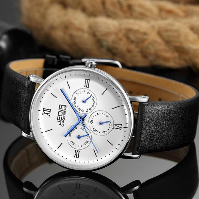WJ-7396 gli orologi degli uomini di marca delle vendite all'ingrosso JEDIR il più tardi progettano gli orologi automatici del cuoio del giorno della data di Handwatches del quarzo 3ATM